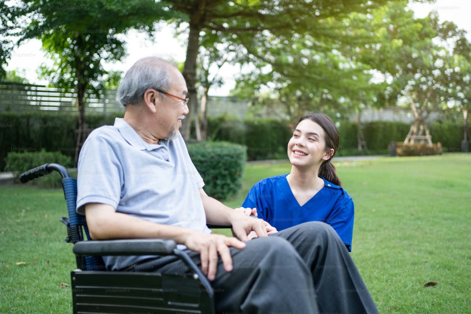 Support worker and participant enjoying time together outdoors